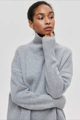 Asymmetric Cape Sleeve Turtleneck Knit Sweater