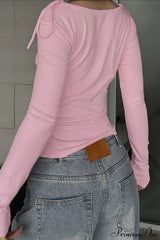 Dopamine Ruffled Tie Waist Draped Neck Long Sleeve Tee